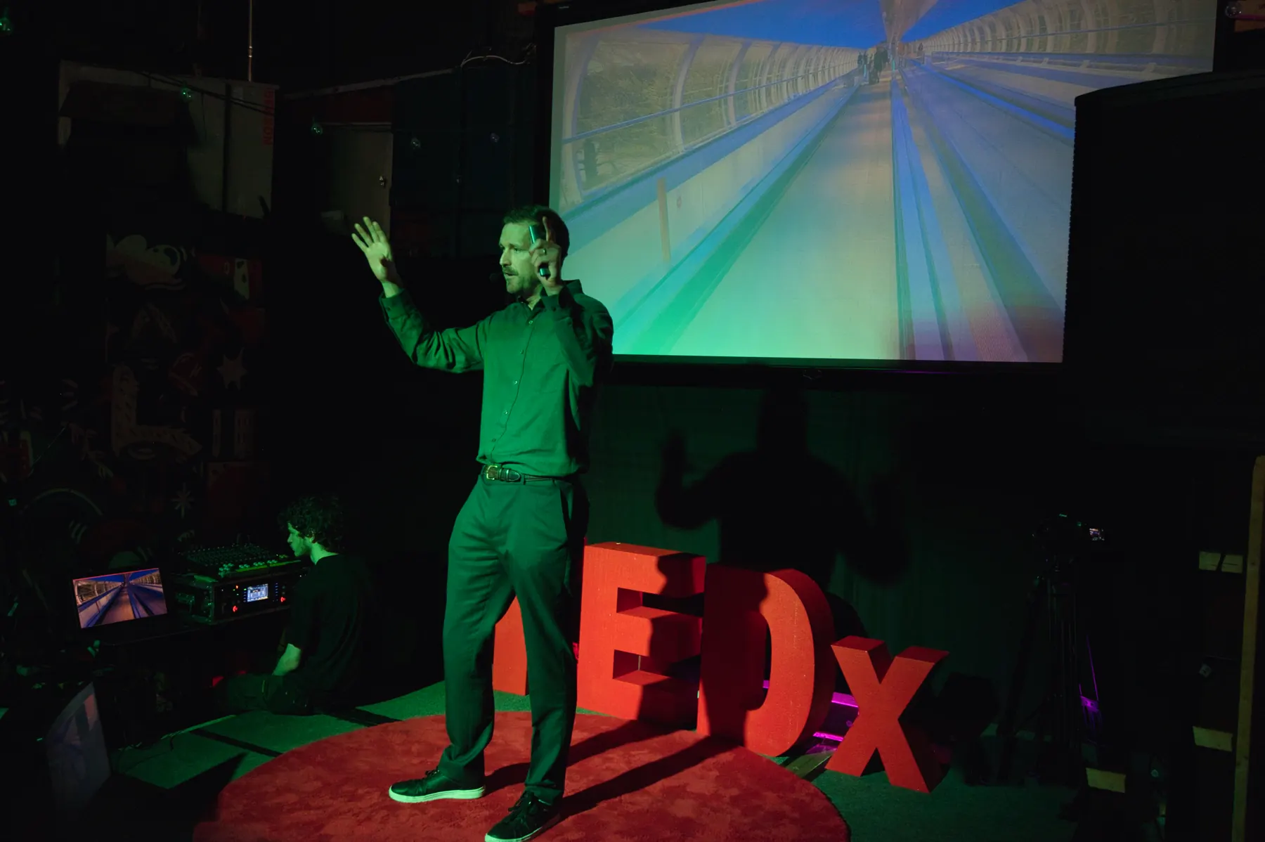 Nat Baldwin speaking on the TEDxLeith stage
